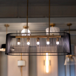 Люстра подвесная овальной формы с металлическим решетчатым абажуром матово-черного цвета и 5 лампами Kichler варинант исполнения - 7 | Loft Concept в Волгограде