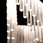 Люстра золотого цвета в форме галочки с каскадом длинных прозрачных трубок Eurofase варинант исполнения - 11 | Loft Concept в Волгограде